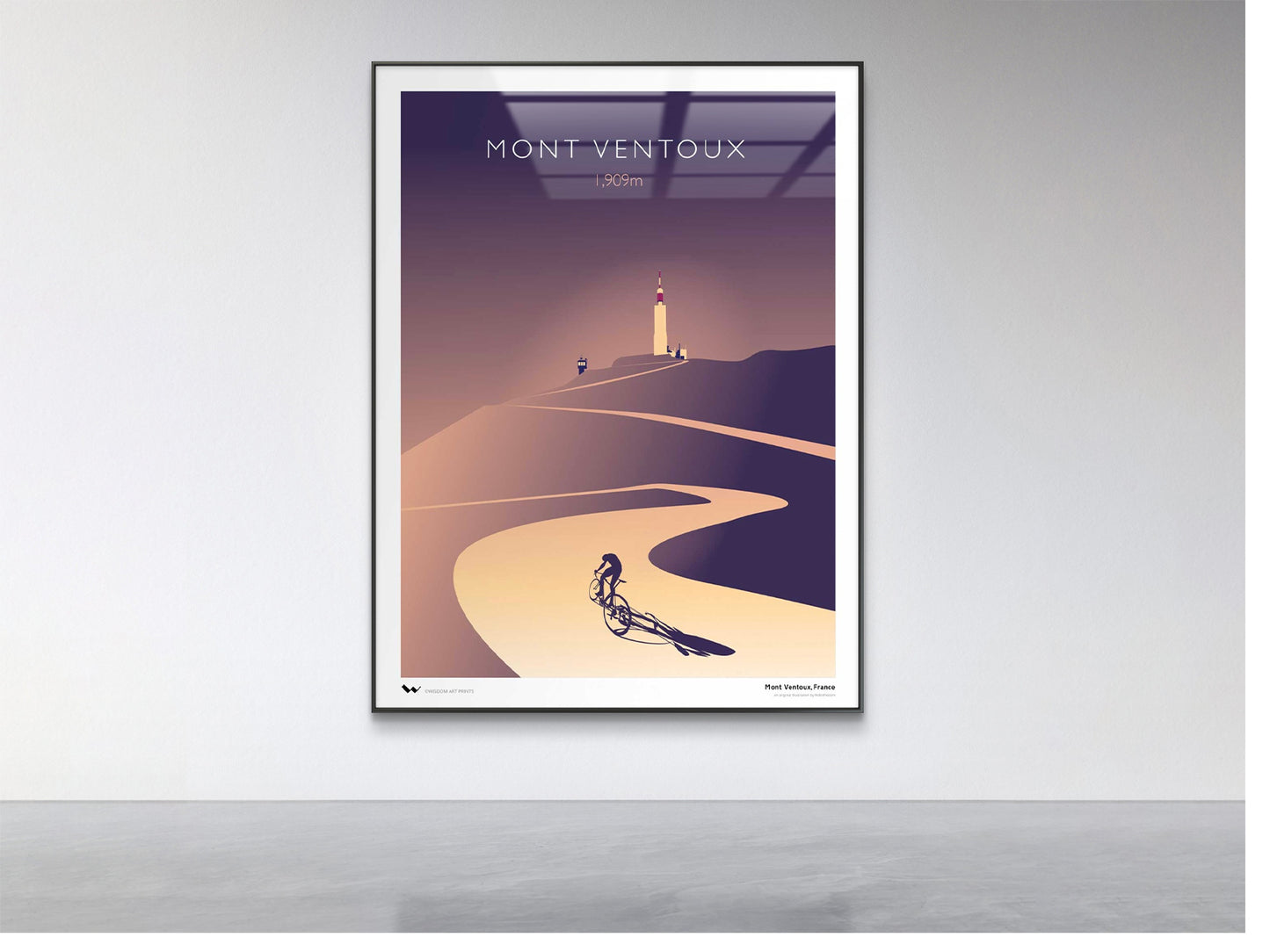 Framed poster of a cyclist on Mont Ventoux with a signal tower in the background.