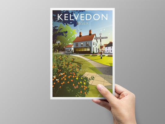 Greeting card of Kelvedon, Essex held by a hand against a gray background