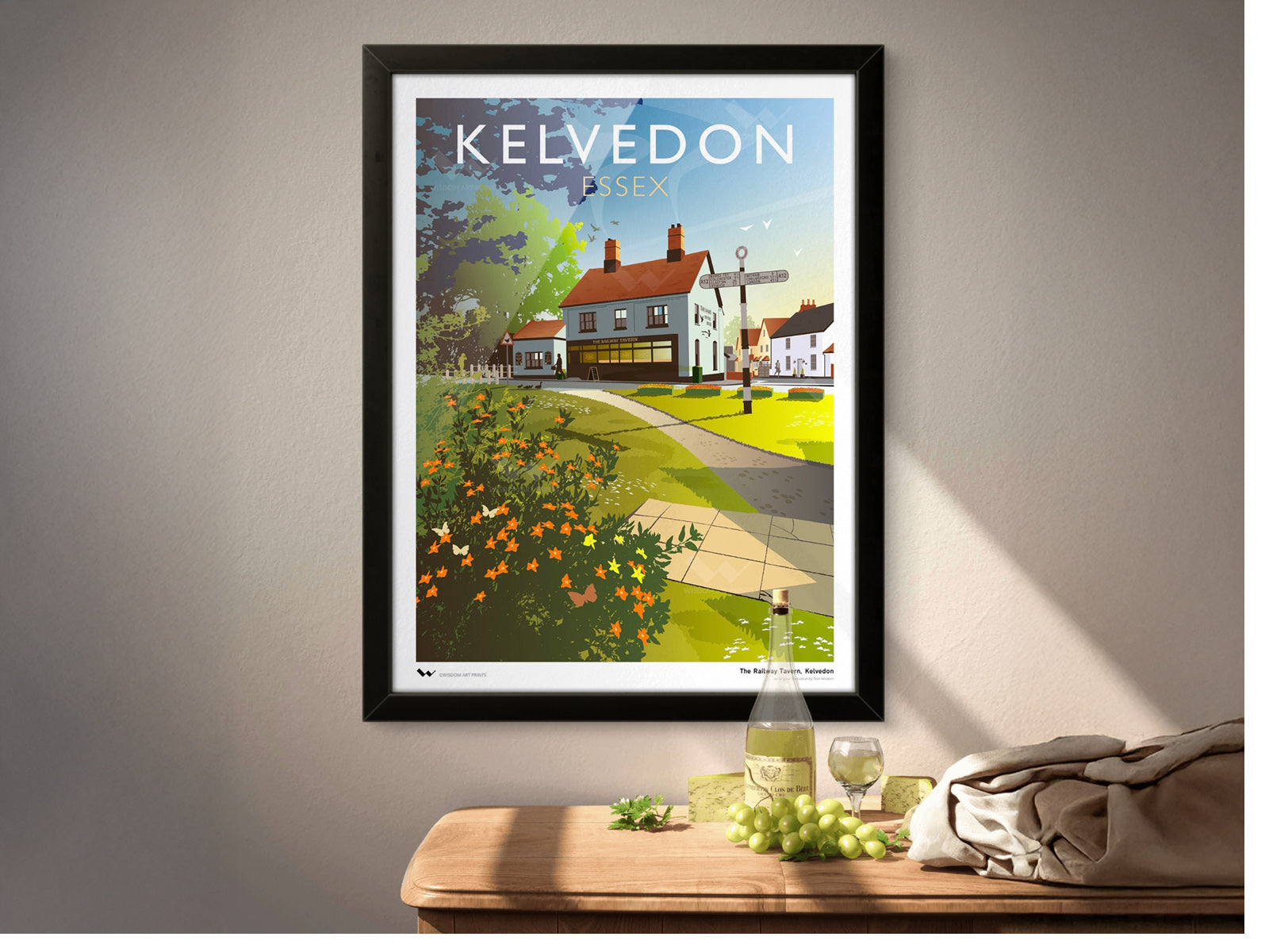 Framed art print of Kelvedon, Essex, showing a view of the Railway Tavern near the river.
