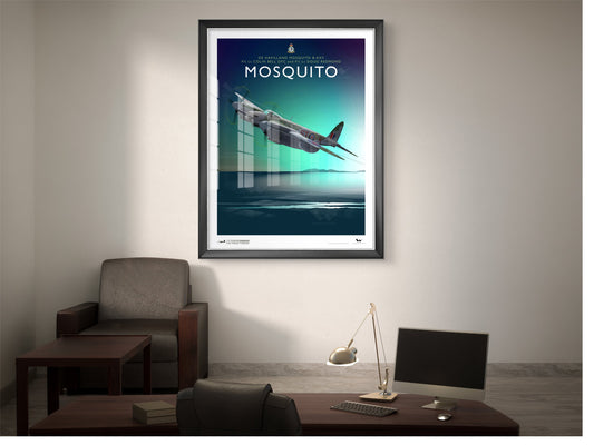 Framed art print of a de Havilland Mosquito, shown in a lounge/office room setting.